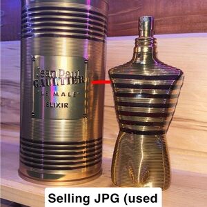 Jean Paul Gaultier Gold Striped Le Male Elixir Bottle
